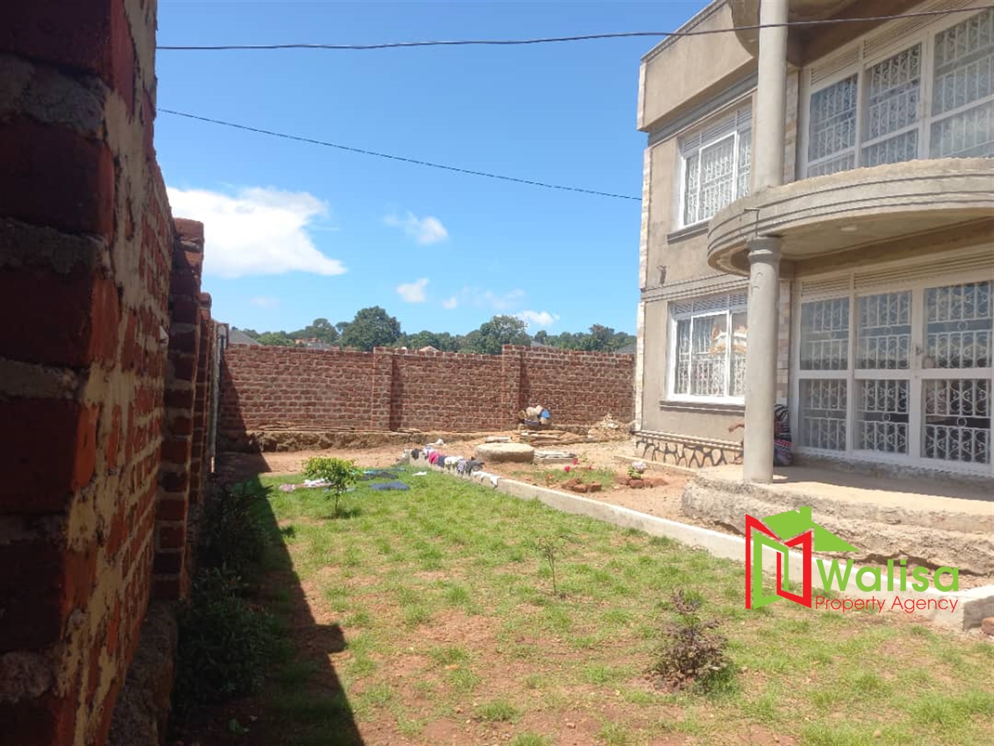 Storeyed house for sale in Mpala Wakiso