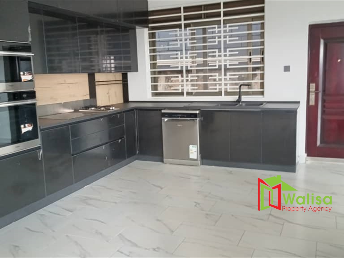 Storeyed house for sale in Lutembe Wakiso